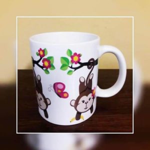 Monkey Hanging from Branch with Butterfly - Coffee Mug